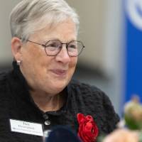 Jan Heerspink seated at table and smiling